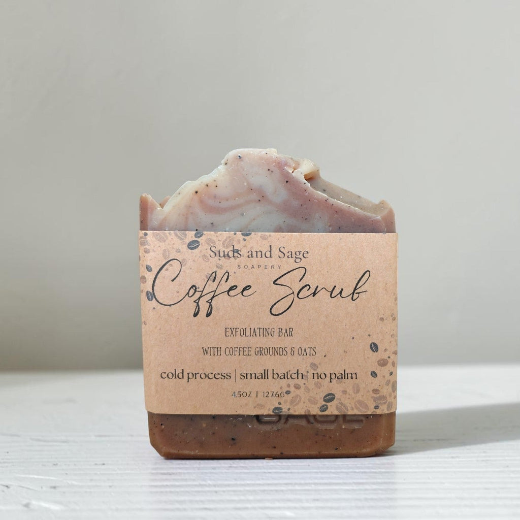 coffee scrub soap sitting on a white table